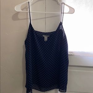 White polka dot blue top